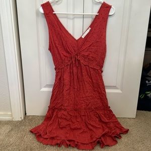 Lush rust colored tiered mini dress